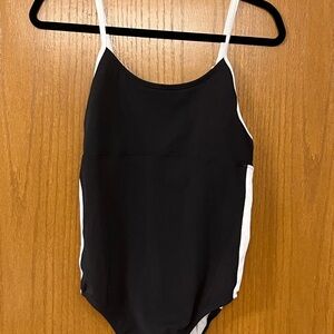 Speedo swimsuit. Size 9/10. Built in bra.  Adjustable straps.  Flattering.